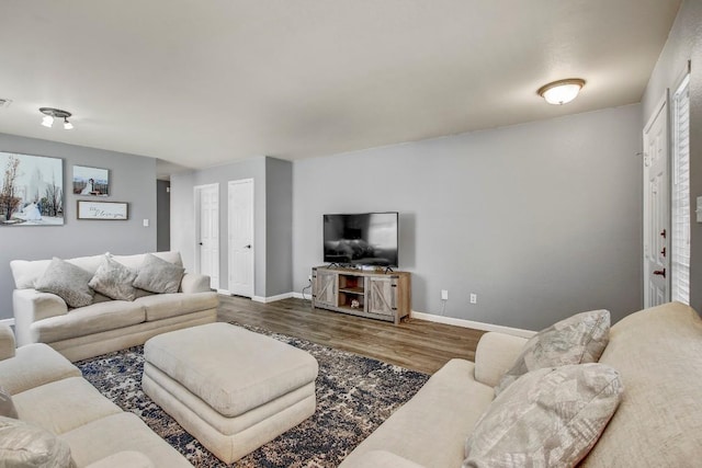 1032 Stacias Way, Pflugerville, TX 78660 - living room featuring wood finished floors and baseboards
