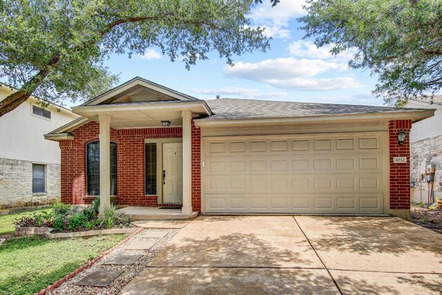 1032 Stacias Way, Pflugerville, TX 78660 - ranch-style home featuring driveway, an attached garage, brick siding, and a shingled roof
