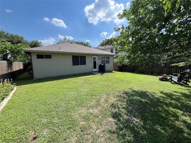 1032 Stacias Way, Pflugerville, TX 78660 - rear view of property featuring a shingled roof