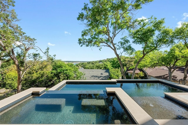 806 Sunfish St, Lakeway, TX 78734 - view of pool featuring a pool with connected hot tub