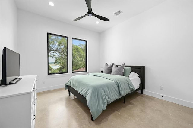 806 Sunfish St, Lakeway, TX 78734 - bedroom with concrete floors, recessed lighting, and a ceiling fan