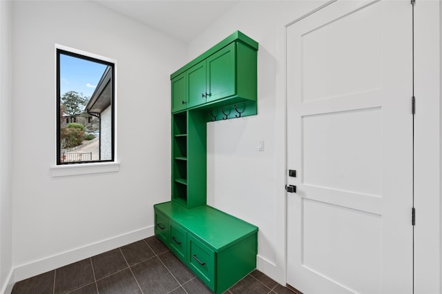 806 Sunfish St, Lakeway, TX 78734 - mudroom featuring baseboards and dark tile patterned flooring
