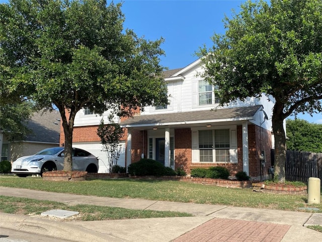 14501 Dreamtime Ln, Pflugerville, TX 78660 - view of front of house with brick siding and a garage