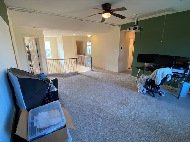 14501 Dreamtime Ln, Pflugerville, TX 78660 - sitting room with carpet, ceiling fan, and an upstairs landing