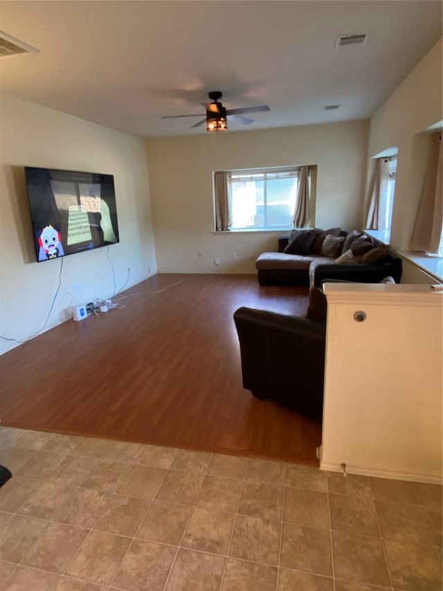 14501 Dreamtime Ln, Pflugerville, TX 78660 - living area with ceiling fan and light wood finished floors