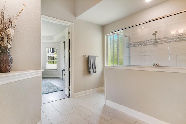 3221 Venezia Vw, Leander, TX 78641 - full bathroom with a walk in shower and baseboards