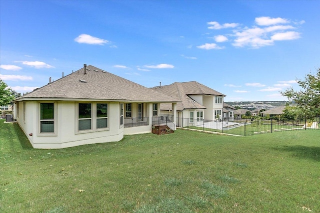 3221 Venezia Vw, Leander, TX 78641 - back of house with roof with shingles and stucco siding