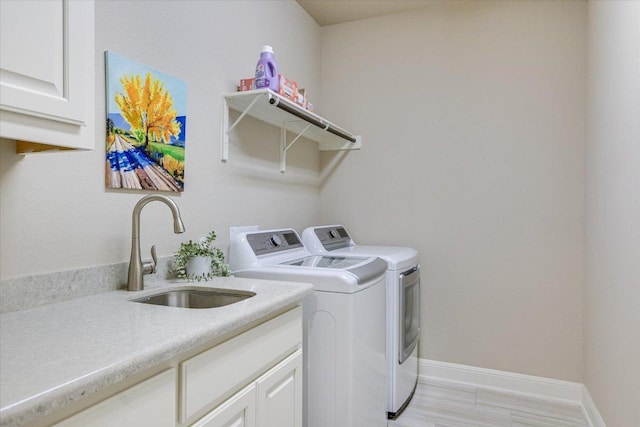 3221 Venezia Vw, Leander, TX 78641 - laundry room with washer and clothes dryer and cabinet space