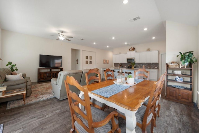 1437 Morning View Rd, Georgetown, TX 78628 - dining room with wood finished floors, ceiling fan, and recessed lighting