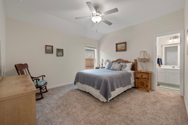 1437 Morning View Rd, Georgetown, TX 78628 - bedroom featuring light carpet, lofted ceiling, baseboards, connected bathroom, and a ceiling fan