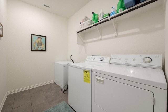 1437 Morning View Rd, Georgetown, TX 78628 - washroom featuring washing machine and clothes dryer and baseboards