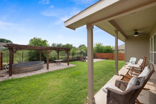 1437 Morning View Rd, Georgetown, TX 78628 - view of yard featuring a pergola, a ceiling fan, and a patio