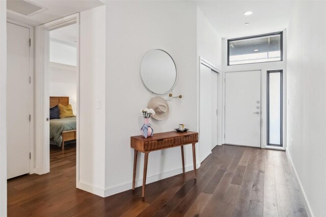 1322 E 12th St Unit 306, Austin, TX 78702 - entrance foyer with dark wood-style floors and baseboards