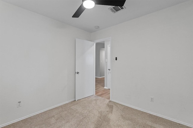 5902 Shreveport Dr, Austin, TX 78727 - spare room with ceiling fan, light colored carpet, and baseboards