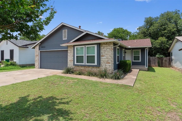 5902 Shreveport Dr, Austin, TX 78727 - view of front of house featuring stone siding, concrete driveway, a garage, and a shingled roof