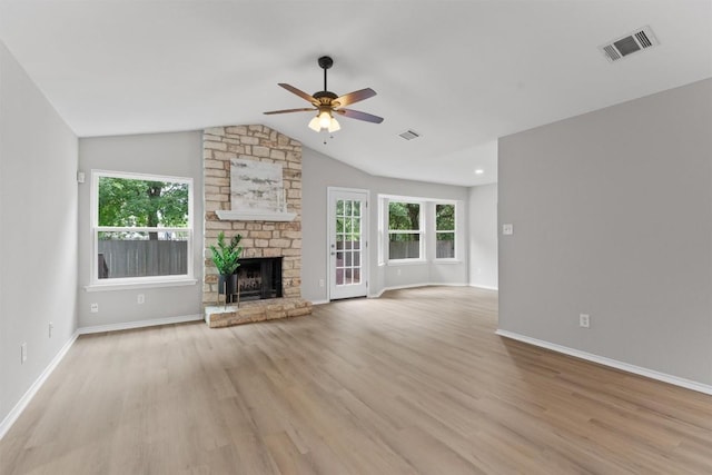 5902 Shreveport Dr, Austin, TX 78727 - unfurnished living room with a ceiling fan, light wood-type flooring, baseboards, lofted ceiling, and plenty of natural light