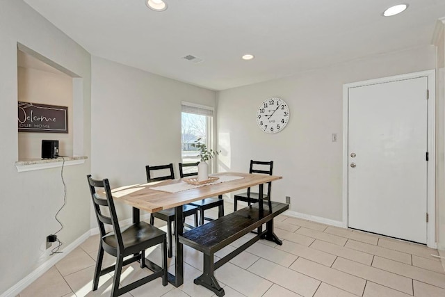 3310 Monument Dr, Round Rock, TX 78681 - dining space with recessed lighting, baseboards, and light tile patterned floors