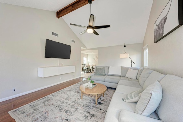 3310 Monument Dr, Round Rock, TX 78681 - living area with ceiling fan, wood finished floors, high vaulted ceiling, beamed ceiling, and baseboards