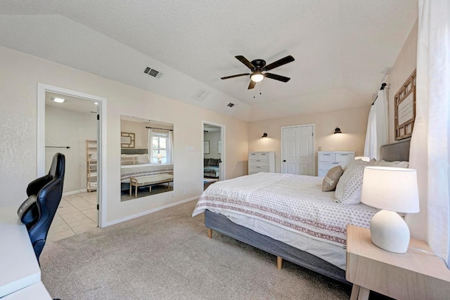 3310 Monument Dr, Round Rock, TX 78681 - bedroom with light colored carpet, connected bathroom, baseboards, and light tile patterned floors