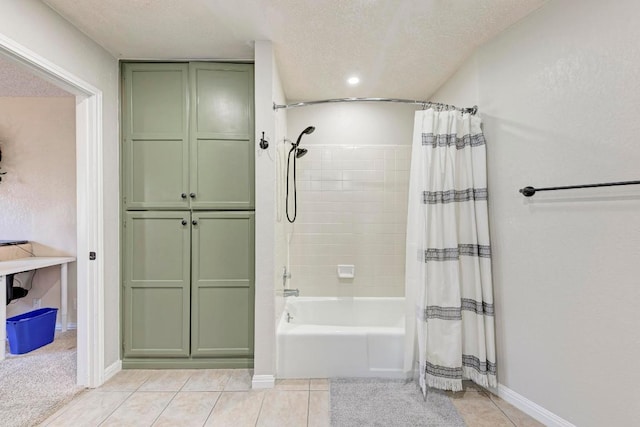 3310 Monument Dr, Round Rock, TX 78681 - bathroom with tile patterned flooring, shower / tub combo with curtain, and a textured ceiling