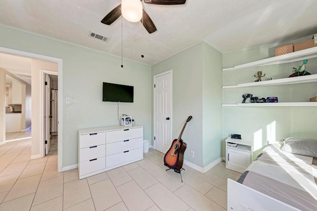 3310 Monument Dr, Round Rock, TX 78681 - bedroom featuring light tile patterned flooring and a ceiling fan