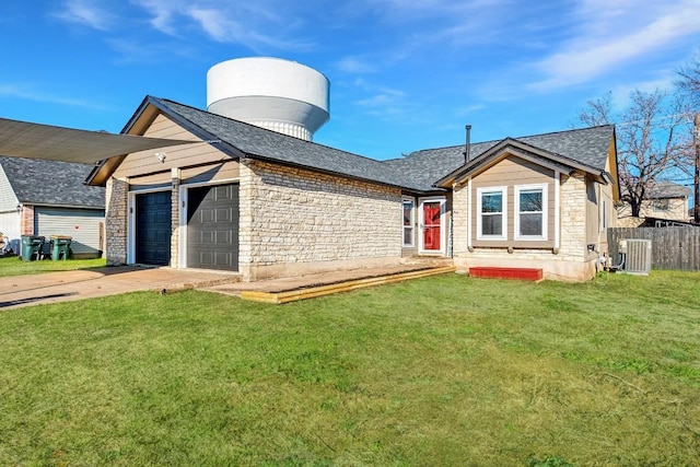 3310 Monument Dr, Round Rock, TX 78681 - view of front of house with stone siding, an attached garage, driveway, central AC unit, and a shingled roof