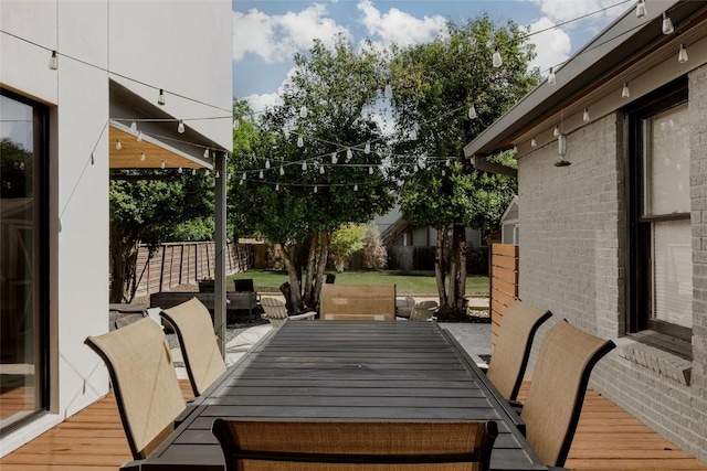 928 E 54th St, Austin, TX 78751 - deck featuring outdoor dining space and a fenced backyard