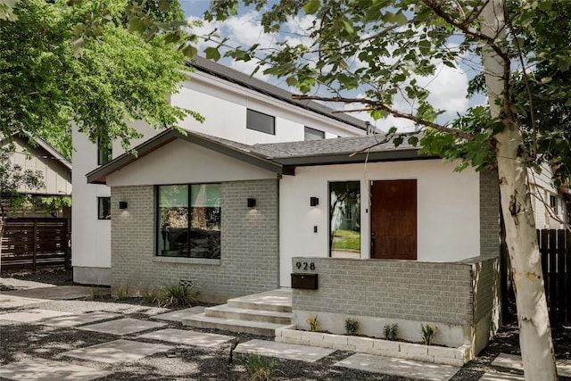 928 E 54th St, Austin, TX 78751 - view of front of home with brick siding and stucco siding