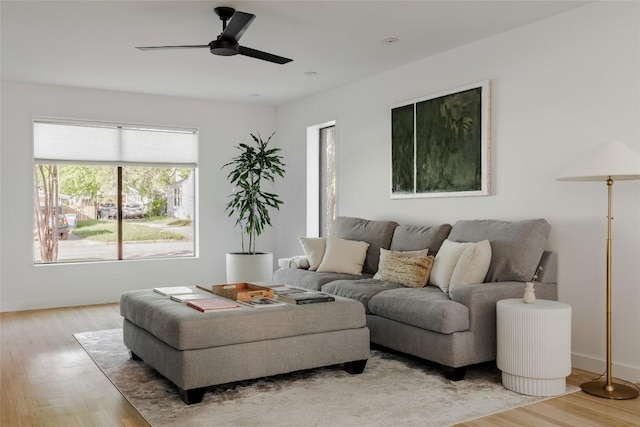 928 E 54th St, Austin, TX 78751 - living area with light wood finished floors and ceiling fan