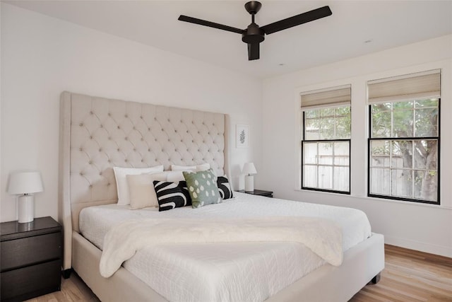 928 E 54th St, Austin, TX 78751 - bedroom with wood finished floors and ceiling fan