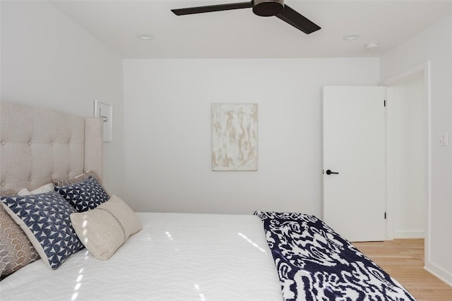 928 E 54th St, Austin, TX 78751 - bedroom with wood finished floors and ceiling fan