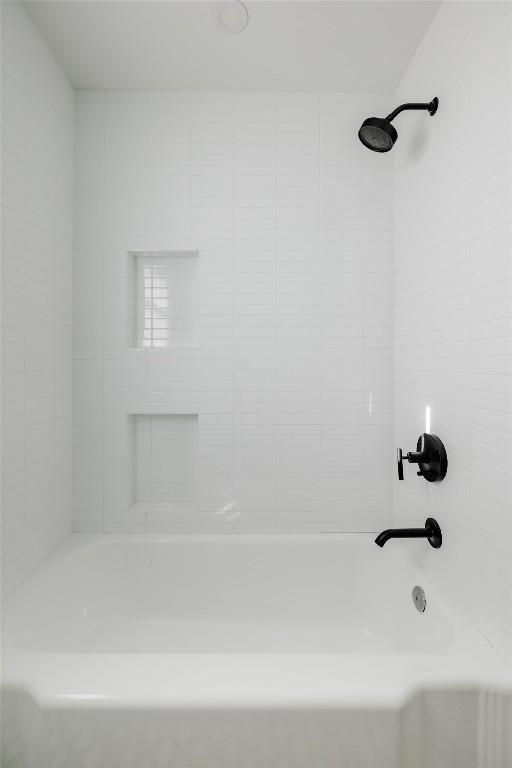928 E 54th St, Austin, TX 78751 - bathroom featuring bathtub / shower combination