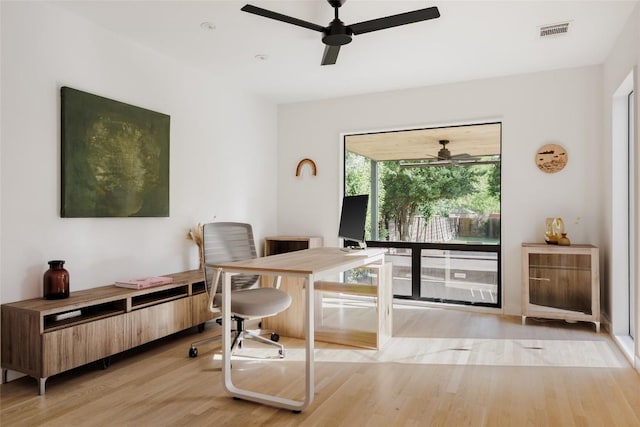928 E 54th St, Austin, TX 78751 - home office featuring ceiling fan and light wood-type flooring