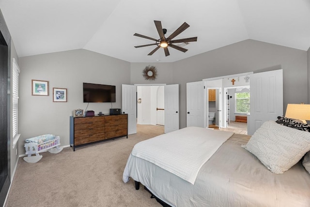 2003 Red Oak Cir, Round Rock, TX 78681 - bedroom featuring vaulted ceiling, light colored carpet, ceiling fan, and baseboards
