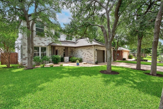 2003 Red Oak Cir, Round Rock, TX 78681 - view of front facade featuring a garage, driveway, and brick siding