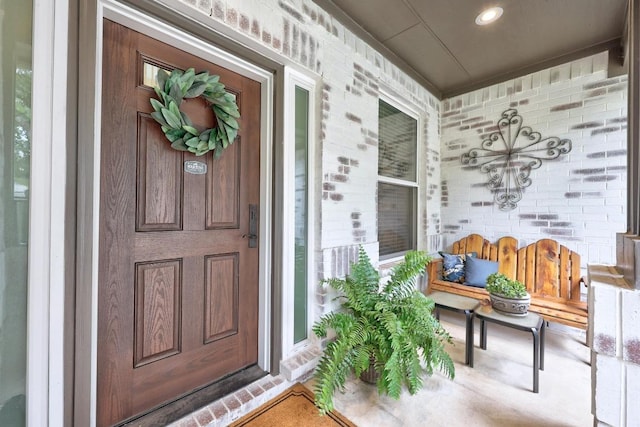 2003 Red Oak Cir, Round Rock, TX 78681 - view of exterior entry with covered porch and brick siding
