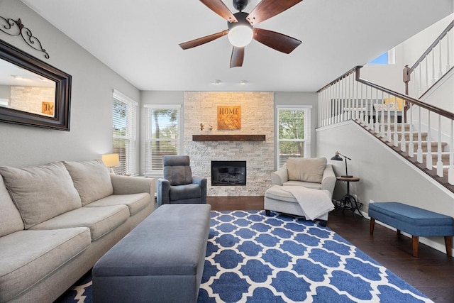 2003 Red Oak Cir, Round Rock, TX 78681 - living room with healthy amount of natural light, wood finished floors, a ceiling fan, and stairway