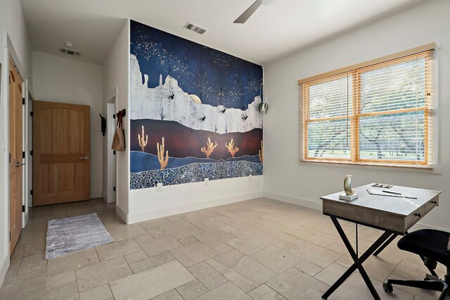 2819 Cross Rd, San Marcos, TX 78666 - bedroom with baseboards and stone tile flooring
