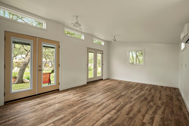 2819 Cross Rd, San Marcos, TX 78666 - spare room with french doors, wood finished floors, and baseboards