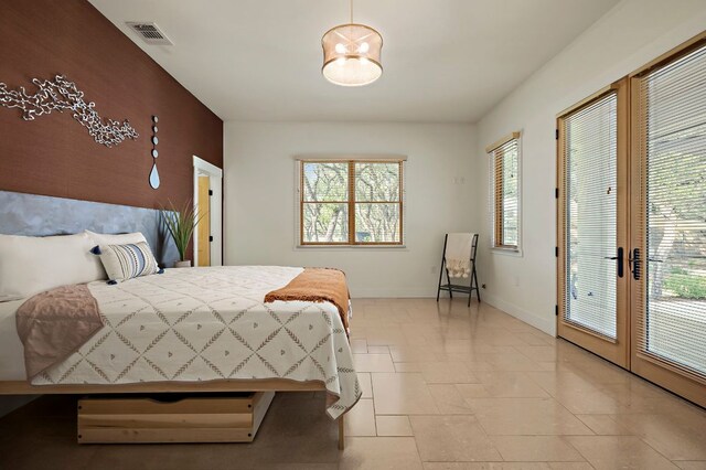 2819 Cross Rd, San Marcos, TX 78666 - bedroom featuring french doors and baseboards