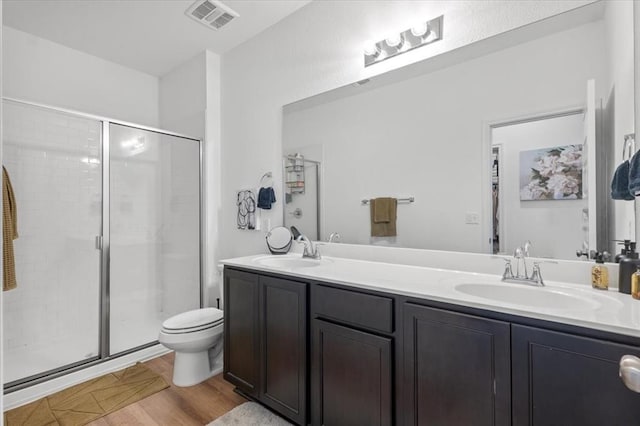 8103 Mandela Bnd, Austin, TX 78744 - full bathroom featuring a shower stall, double vanity, and toilet