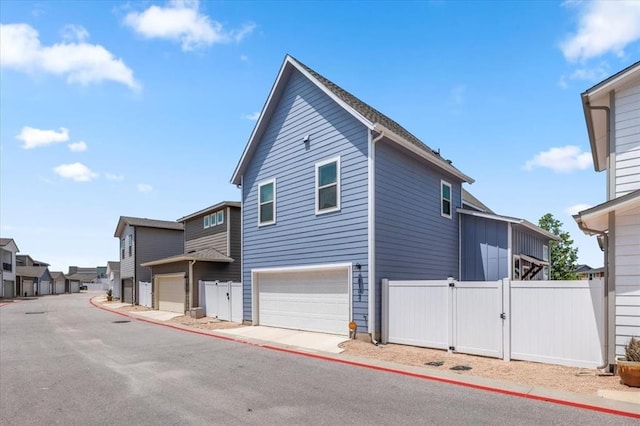 8103 Mandela Bnd, Austin, TX 78744 - view of home's exterior with a garage