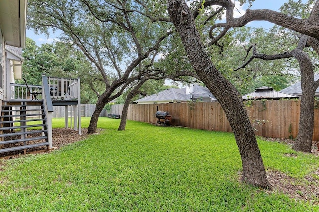3712 Cerulean Way, Round Rock, TX 78681 - fenced backyard featuring stairway and a deck