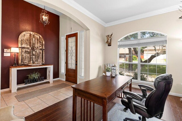 3712 Cerulean Way, Round Rock, TX 78681 - office with arched walkways, ornamental molding, hardwood / wood-style flooring, and a chandelier