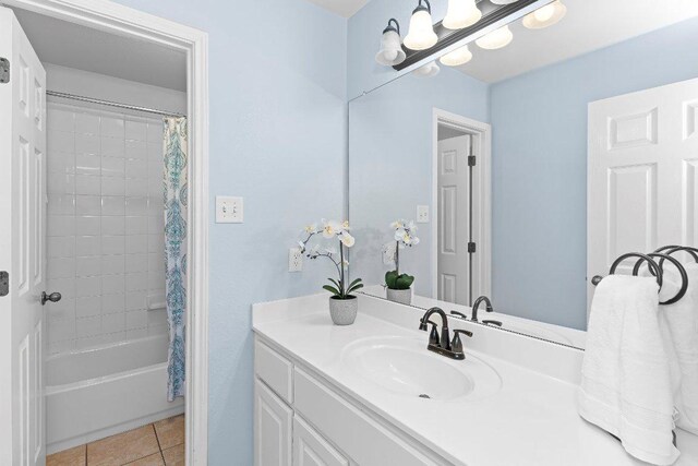 3712 Cerulean Way, Round Rock, TX 78681 - bathroom featuring vanity, tile patterned floors, and shower / bath combo