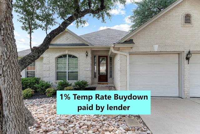 3712 Cerulean Way, Round Rock, TX 78681 - view of front of house with an attached garage, roof with shingles, brick siding, and driveway