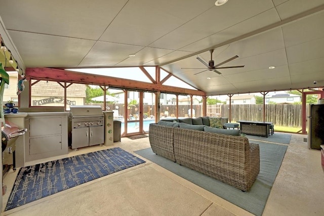 5504 Alomar Cv, Del Valle, TX 78617 - fenced backyard featuring an outdoor living space, a patio area, a ceiling fan, a grill, and a swimming pool