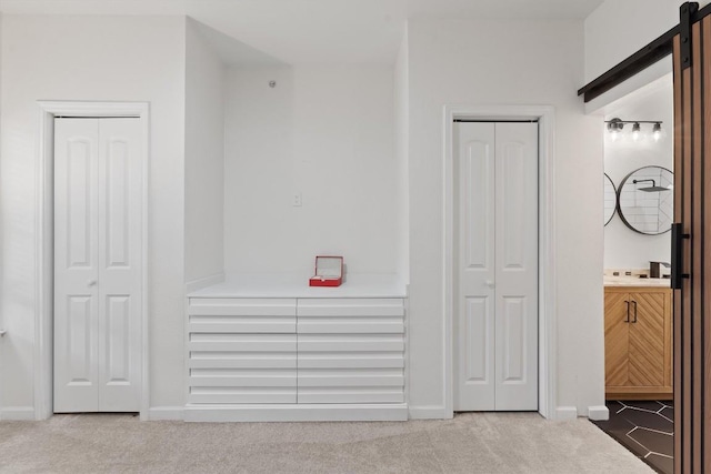 9525 N Capital Of Texas Hwy Unit 617, Austin, TX 78759 - corridor featuring carpet and a barn door