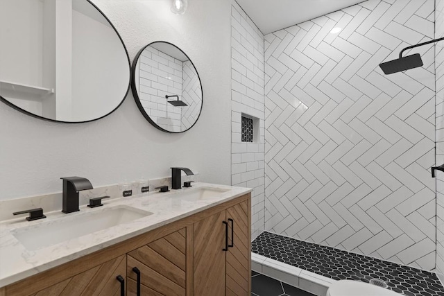 9525 N Capital Of Texas Hwy Unit 617, Austin, TX 78759 - bathroom with double vanity and tiled shower