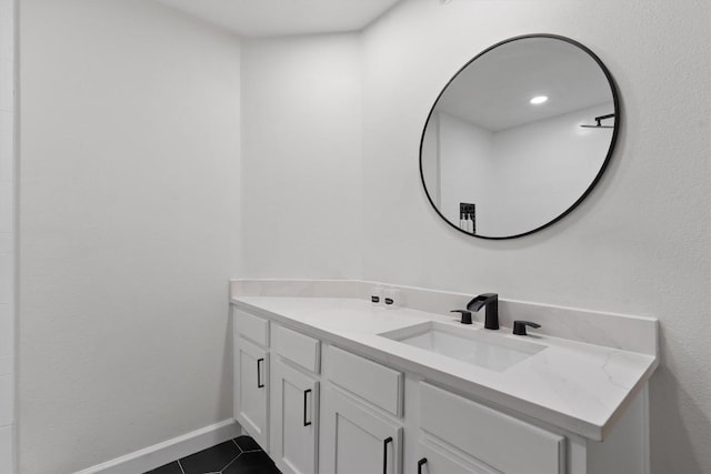 9525 N Capital Of Texas Hwy Unit 617, Austin, TX 78759 - bathroom featuring vanity, tile patterned flooring, and baseboards